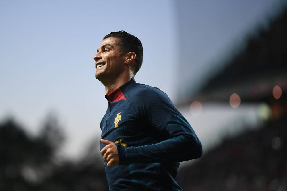 This file photo taken on September 27, 2022 shows Portugal's forward Cristiano Ronaldo warming up prior the Uefa Nations League, league A, group 2 football match between Portugal and Spain, at the Municipal Stadium in Braga. — AFP pic