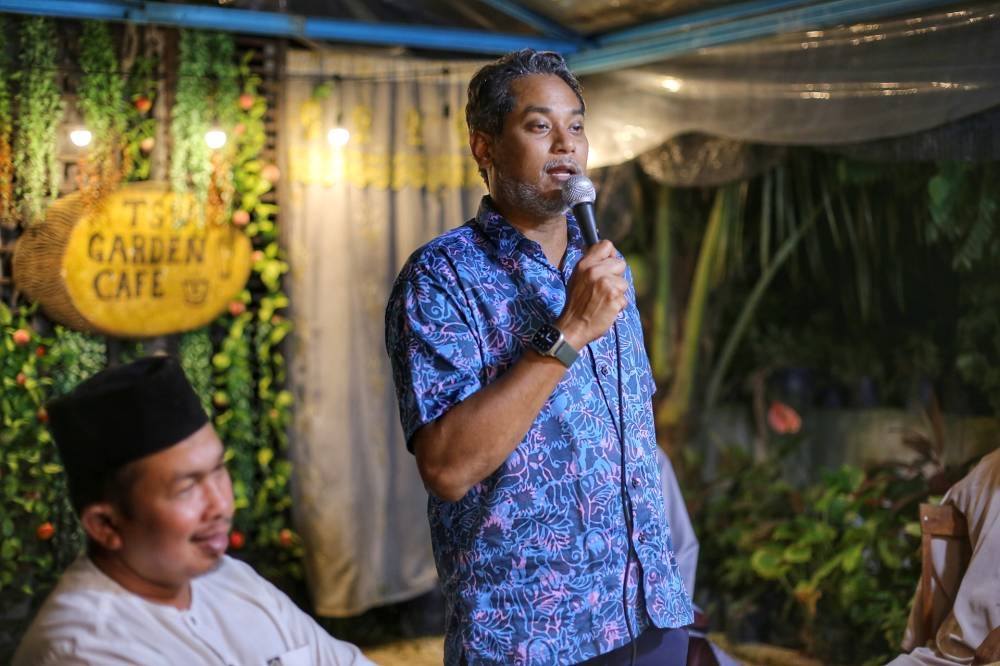 P107 Barisan Nasional candidate Khairy Jamaluddin speaks in front of Taman Setia Warisan residents during meet and greet session, November 7,2022. — Picture by Ahmad Zamzahuri