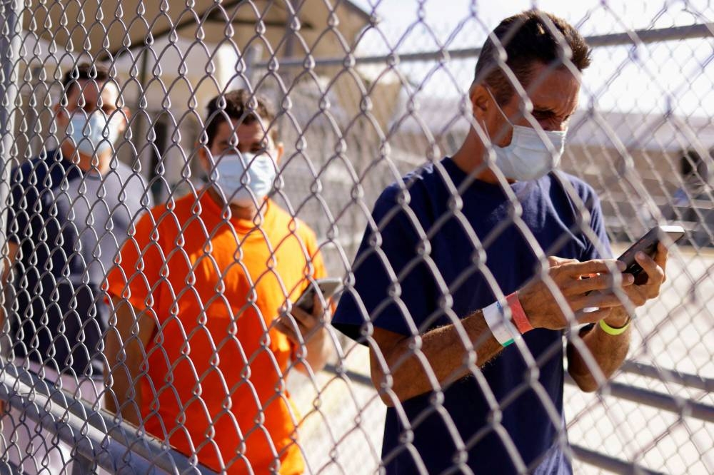 Cuban migrants, expelled from the US and sent back to Mexico under Title 42, walk towards Mexico at the Lerdo Stanton International border bridge, in Ciudad Juarez, Mexico May 3, 2022. ― Reuters file pic