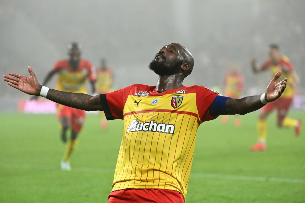 Lens' Franco-Ivorian midfielder Seko Fofana celebrates scoring his team's second goal during the French L1 football match between RC Lens and Clermont Foot 63 at the Bollaert-Delelis stadium in Lens on November 12, 2022. — AFP pic