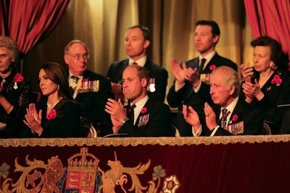 Britain's Catherine, Princess of Wales, (left) Britain's Prince William, Prince of Wales (2nd left) and Britain's King Charles III (R) attend the annual Royal British Legion Festival of Remembrance at the Royal Albert Hall in London on November 12, 2022. — Chris Radburn/Pool/AFP pic