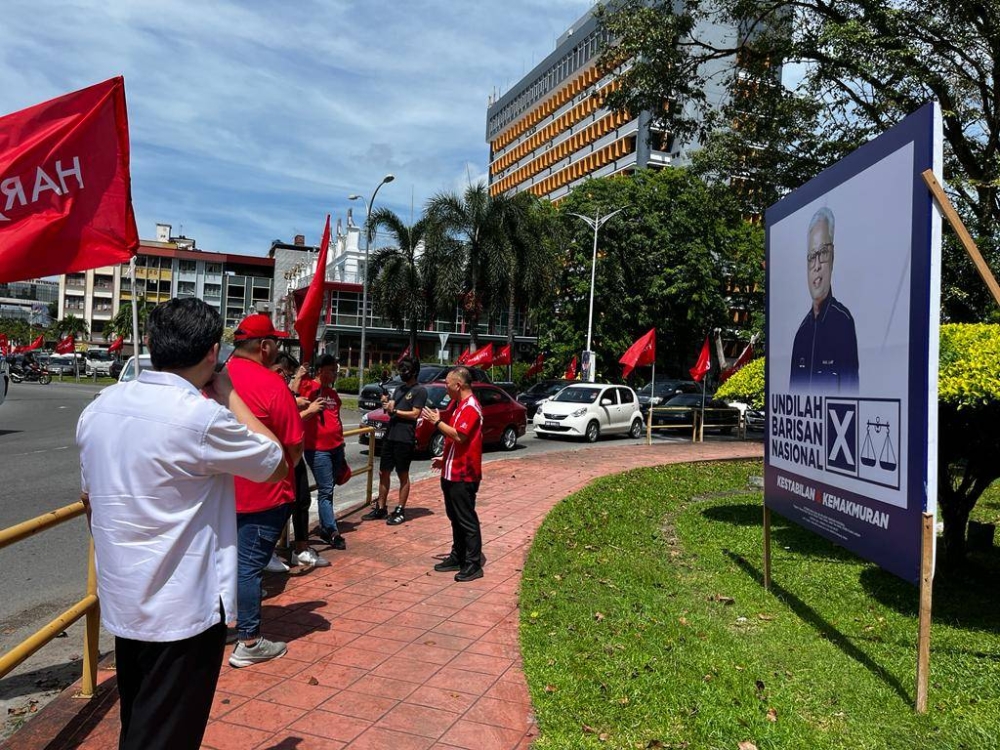 A billboard of caretaker prime minister Datuk Ismail Sabri Yaakob is seen in Kota Kinabalu, November 7, 2022. — Picture by Julia Chan