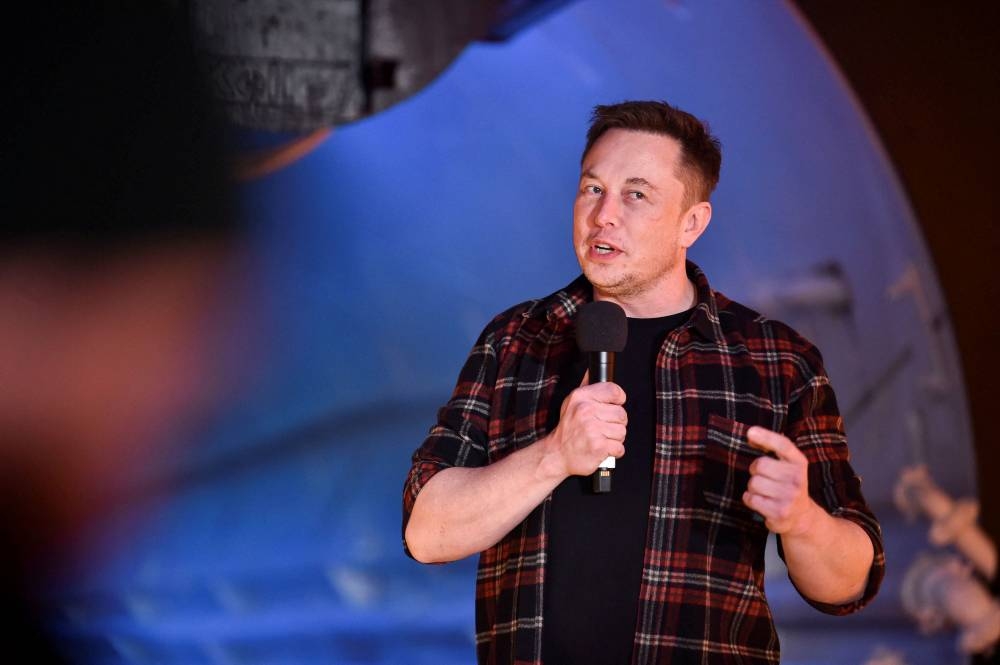 Tesla Inc founder Elon Musk speaks at the unveiling event by ‘The Boring Company’ for the test tunnel of a proposed underground transportation network across Los Angeles County, in Hawthorne, California December 18, 2018. — Robyn Beck/Pool/Reuters pic