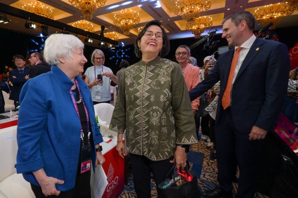 US Treasury Secretary Janet Yellen (left), Indonesia's Finance Minister Sri Mulyani (centre) and Australian Treasurer Jim Chalmers (right) meet before launching a pandemic fund as part of the G20 dialogue, in Nusa Dua on the Indonesian resort island of Bali on November 13, 2022. — AFP pic