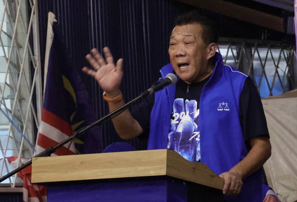 Sabah Deputy Chief Minister who is also Sabah Barisan Nasional Chairman Datuk Seri Bung Moktar Radin speaking while campaigning in Kampung Warisan in Inanam, November 9, 2022. — Bernama pic