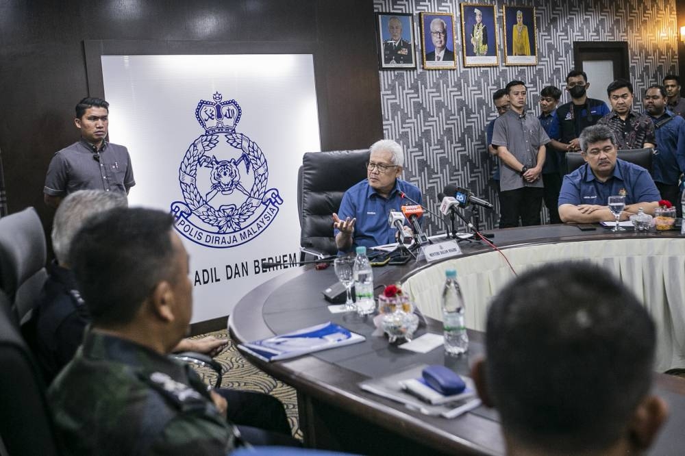 Caretaker home minister Datuk Seri Hamzah Zainudin speaking at a press conference on flood preparation and the 15th general election briefing at the Royal Malaysian Police Technical College, Bakri, Muar, November 13, 2022. — Picture by Hari Anggara
