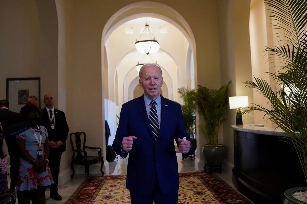 Despite low ratings, US President Joe Biden saw his Democratic Party maintain control of the Senate. — Reuters pic