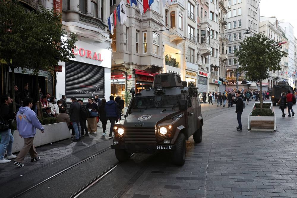 A vehicle of the security forces drives near the scene after an explosion on busy pedestrian Istiklal street in Istanbul, Turkey, November 13, 2022.  — Reuters pic