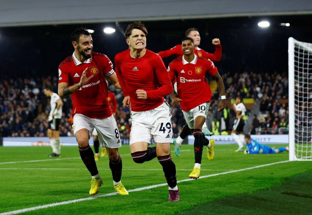 Manchester United's Alejandro Garnacho celebrates scoring their second goal against Fulham at Craven Cottage, London November 13, 2022. — Reuters pic