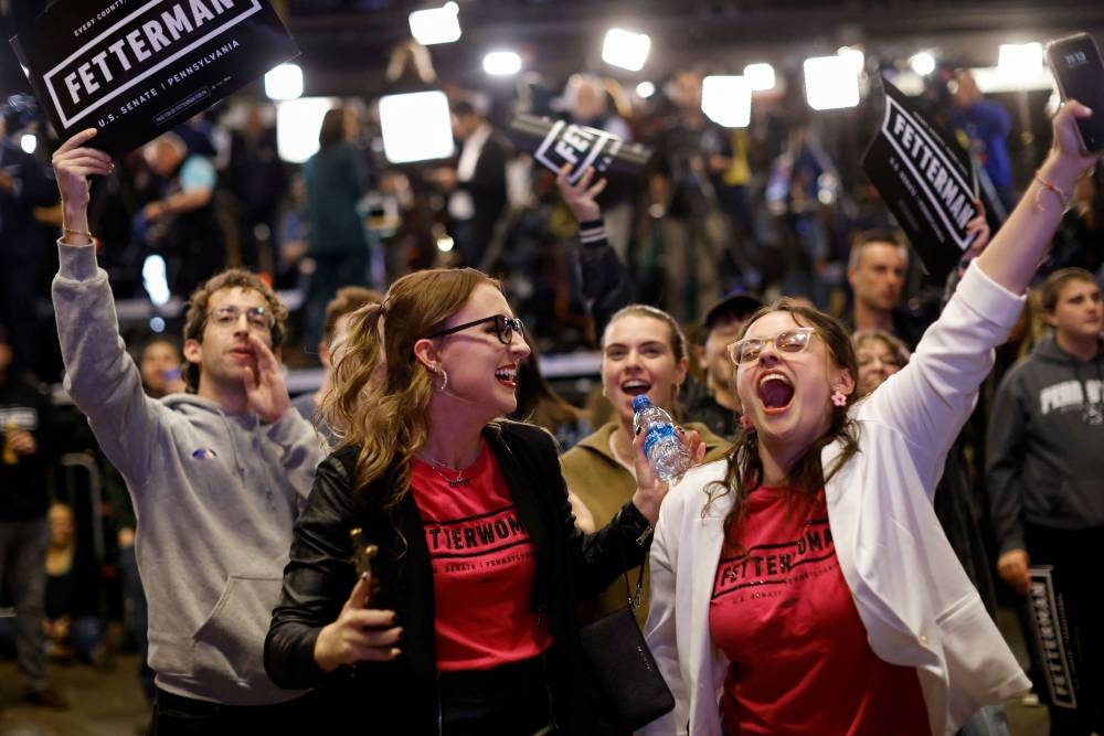 Supporters react as they watch news of projected victory for Democratic candidate for Governor Pennsylvania Attorney General Josh Shapiro at a 2022 US midterm election night party in Pittsburgh, Pennsylvania November 8, 2022. ― Reuters pic