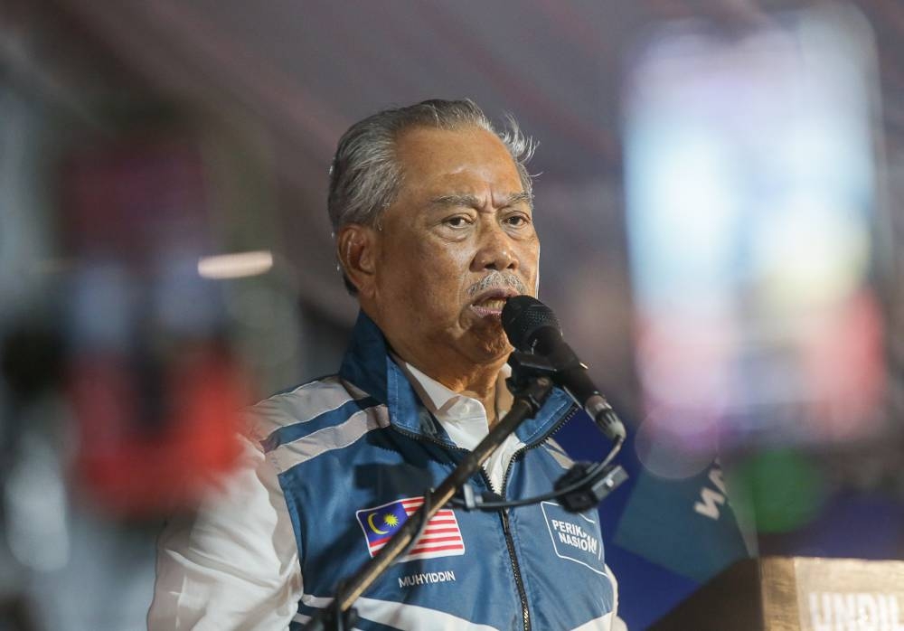 Perikatan Nasional chairman Tan Sri Muhyiddin Yassin gives a speech at the coalition's tour of Tambun in Meru, Ipoh November 13, 2022. — Picture by Farhan Najib
