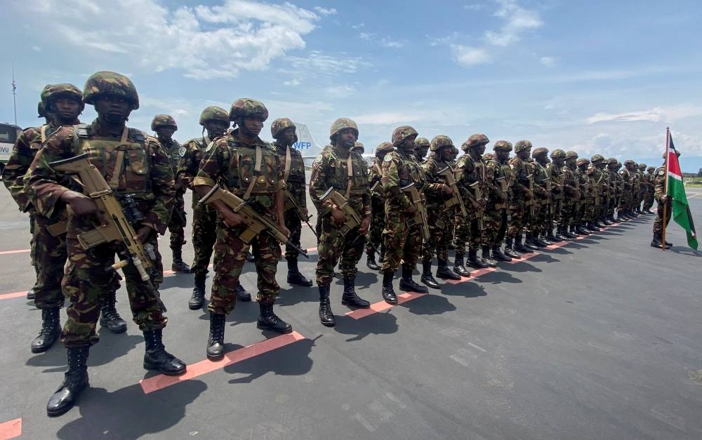 Members of Kenya Defence Forces (KDF), part of the troops of the East Africa Community Regional Force (EACRF), parade as they arrive for their deployment as part of a regional military operation targeting rebels, at the airport in Goma in the North Kivu province of the Democratic Republic of the Congo November 12, 2022. — Reuters pic