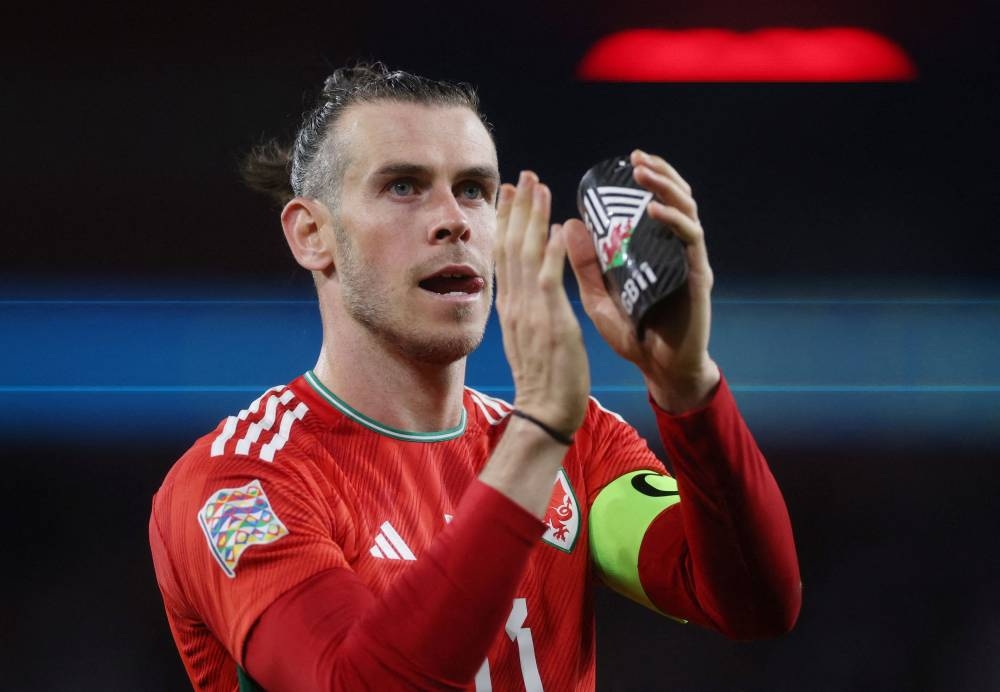 Wales' Gareth Bale applauds fans after the match against Poland at the Cardiff City Stadium September 25, 2022. — Reuters pic