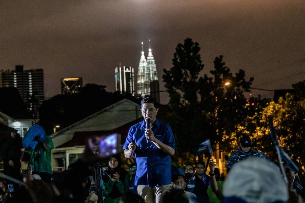 Perikatan Nasional Gombak candidate Datuk Seri Mohamed Azmin Ali speaks during an election campaign rally in Padang AU2 Taman Keramat on November 14, 2022. — Picture by Firdaus Latif