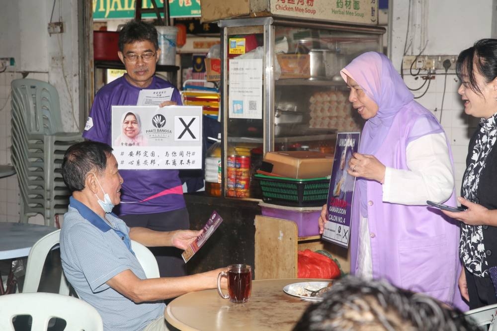 Despite joining her third party since 2018, the familiarity and support that helped the three-term Ampang incumbent get elected in 2008 still remains intact as was evident during a walkabout in Taman Kosas, Bandar Baru Ampang recently. — Picture by Choo Choy May