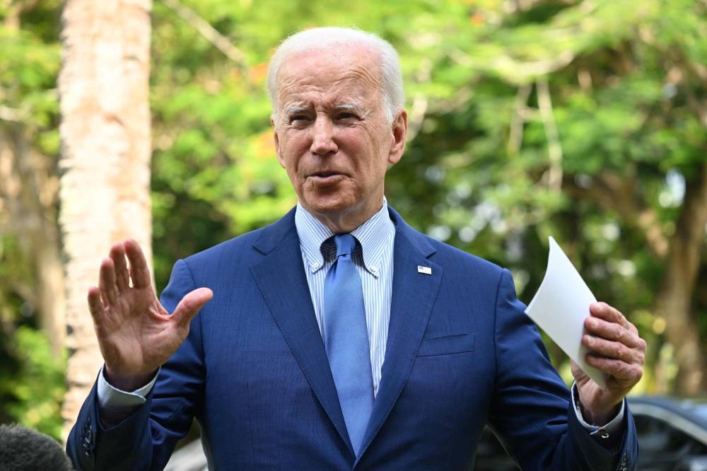 US President Joe Biden speaks about the situation in Poland following a meeting with G7 and European leaders on the sidelines of the G20 Summit in Nusa Dua on the Indonesian resort island of Bali on November 16, 2022. — AFP pic