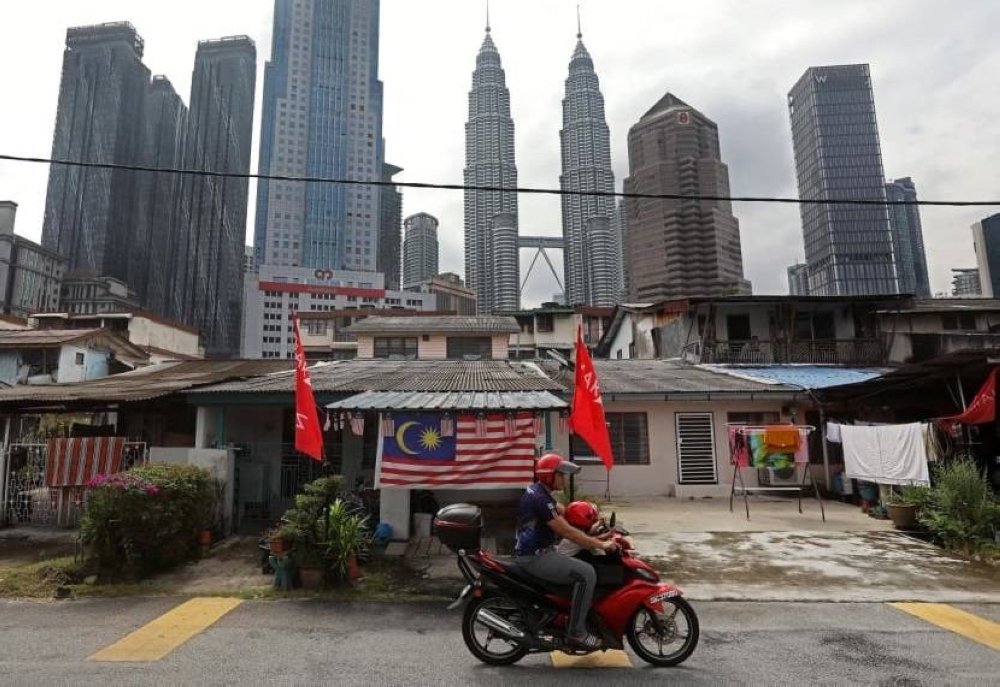 Kampung Baru, the last village left in metropolitan Kuala Lumpur, is just a 15-minute walk away from the famous Petronas Twin Towers. — Picture via TODAY