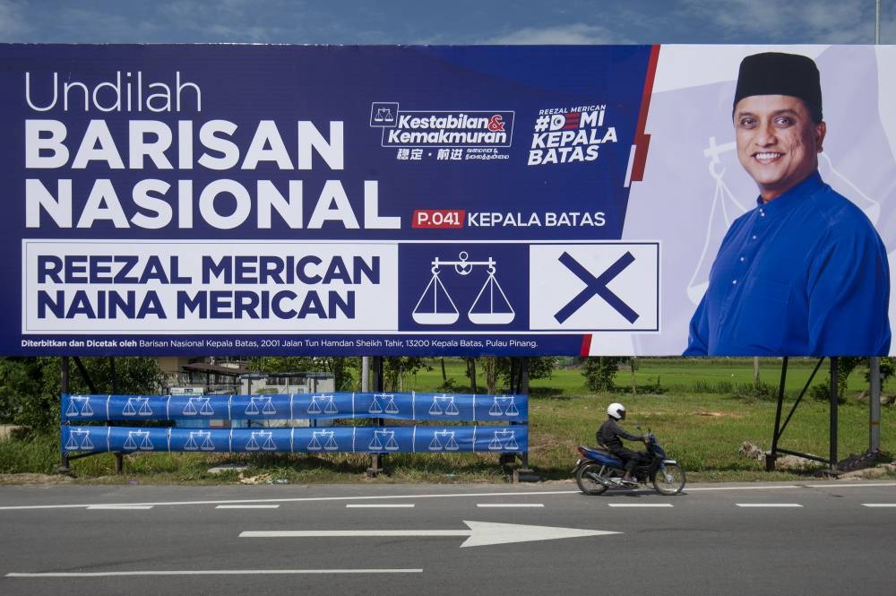 A billboard bearing Datuk Seri Reezal Merican Naina Merican's image is pictured in Kepala Batas November 10, 2022. — Picture by Shafwan Zaidon