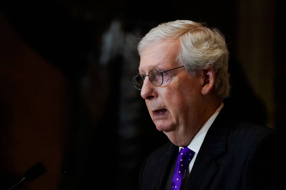 Republican minority leader in the US Senate, Mitch McConnell, handily won re-election by his fellow senators. — Reuters pic