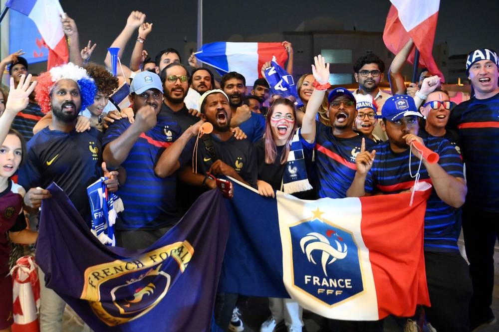 France's supporters react in front of their team hotel in Doha on November 16, 2022. — Reuters pic