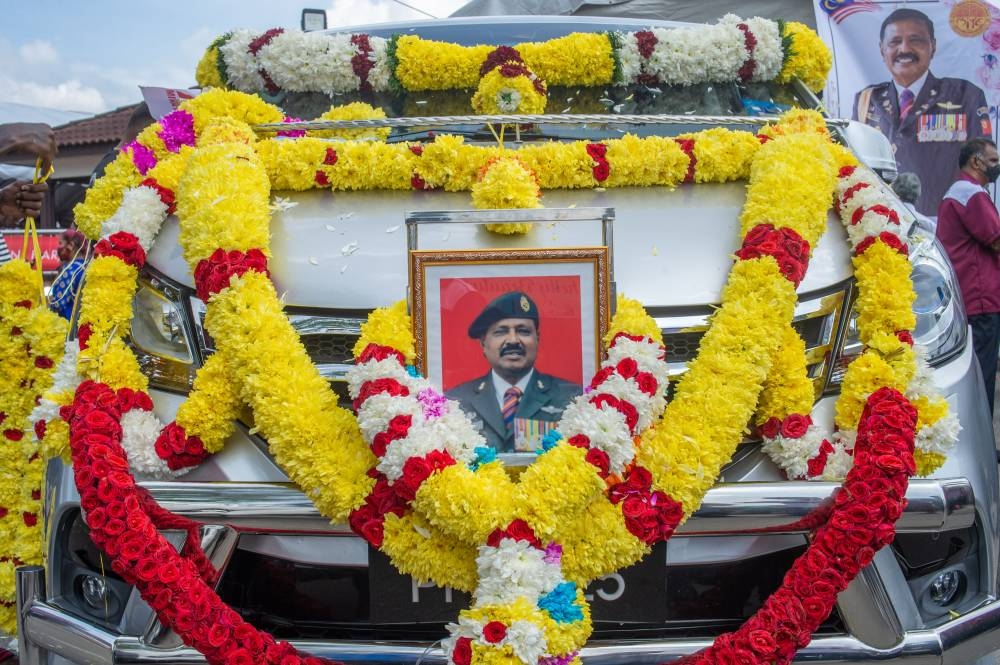 A portrait of M. Karupaiya is seen on the hearse in Padang Serai November 17, 2022. — Picture by Shafwan Zaidon
