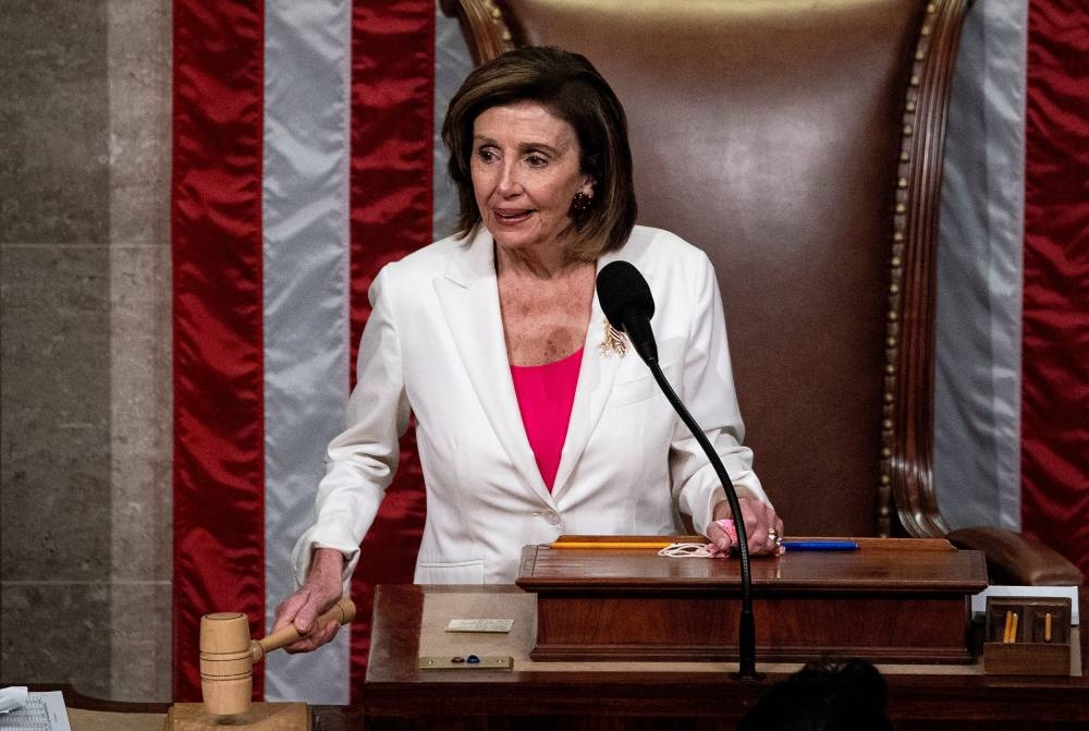 US House Speaker Nancy Pelosi (D-CA) wields her gavel as the US House of Representatives votes on President Joe Biden’s US$1.75 trillion ‘Build Back Better Act’ after hours-long overnight delay in the House Chamber of the US Capitol in Washington November 19, 2021. — Reuters pica