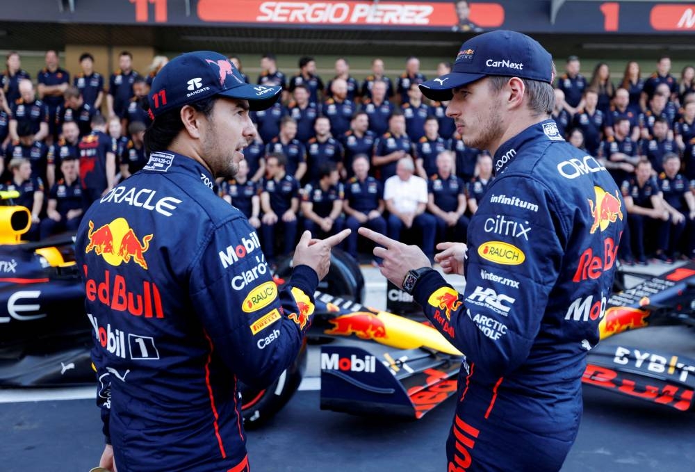 Red Bull’s Max Verstappen and Sergio Perez before the team photo at Yas Marina Circuit, Abu Dhabi, United Arab Emirates, November 17, 2022. — Reuters pic 