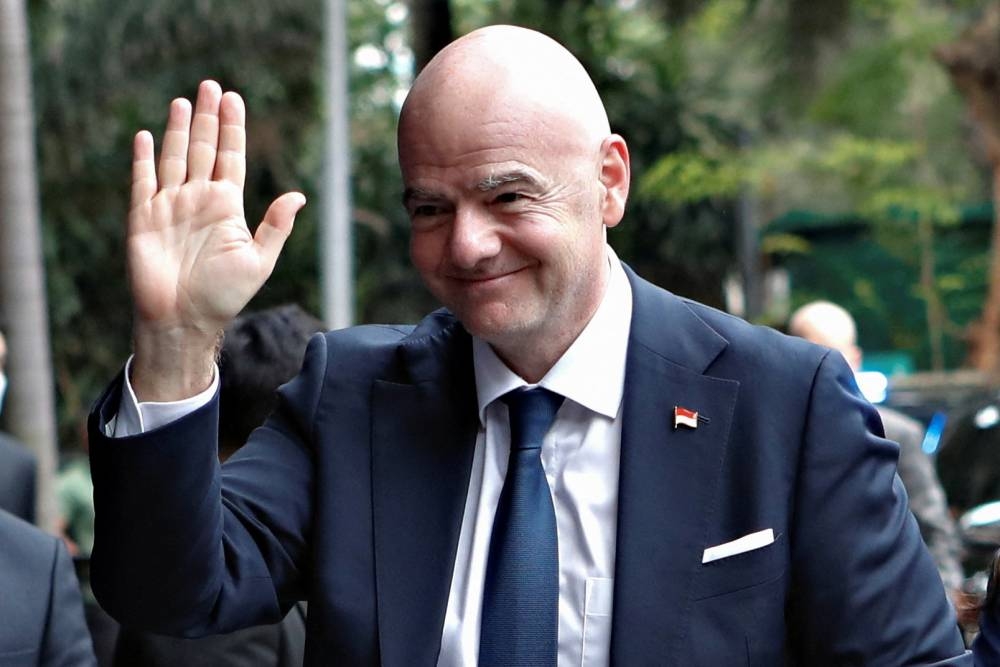 Fifa president Gianni Infantino arrives at Indonesian Football Association (PSSI) headquarters in Jakarta October 18, 2022. — Reuters pic
