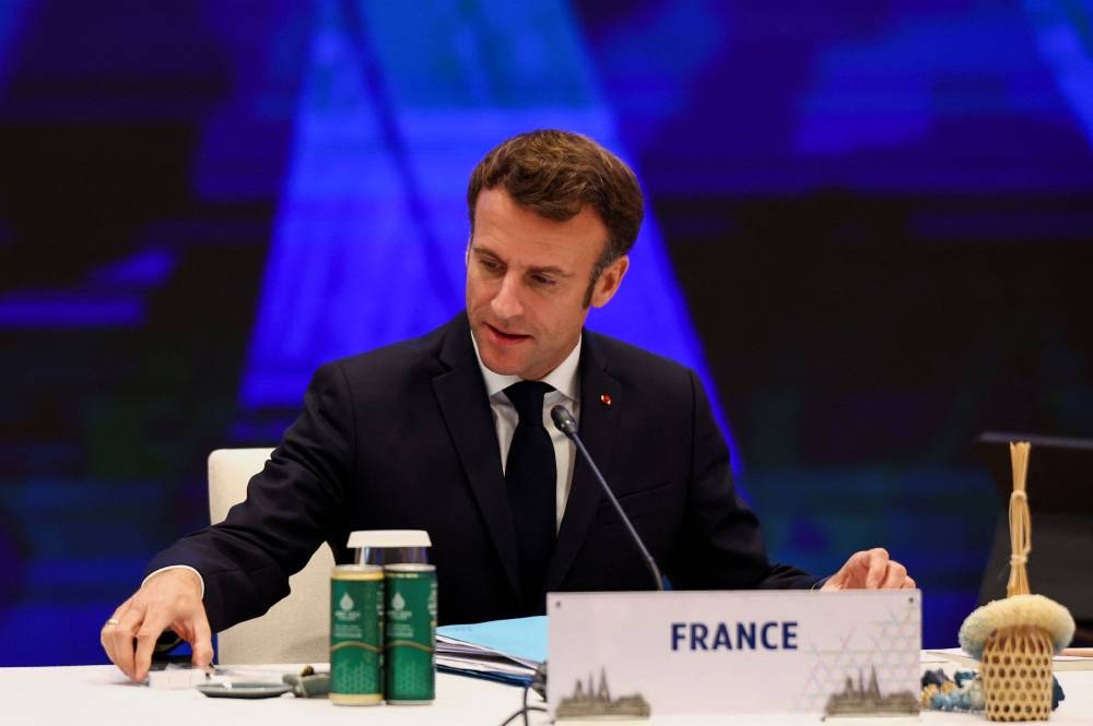France's President Emmanuel Macron cast France as a balancing power in a region long dominated by the superpower tussle between China and the United States. — Reuters pic