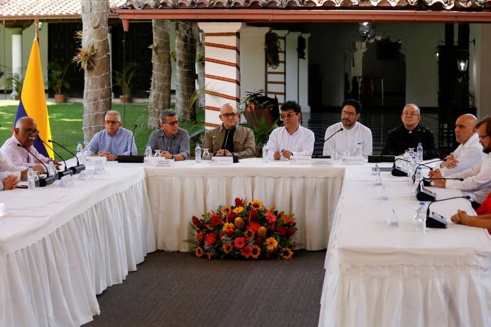 Colombia's Colombia's National Liberation Army (ELN) commanders Pablo Beltran, Antonio Garcia and Aureliano Carbonell, High Commissioner for Peace Ivan Danilo Rueda, Senate Member Ivan Cepeda and Monsignor Hector Fabio Henao attend a news conference, in Caracas, Venezuela October 4, 2022. — Reuters file pic