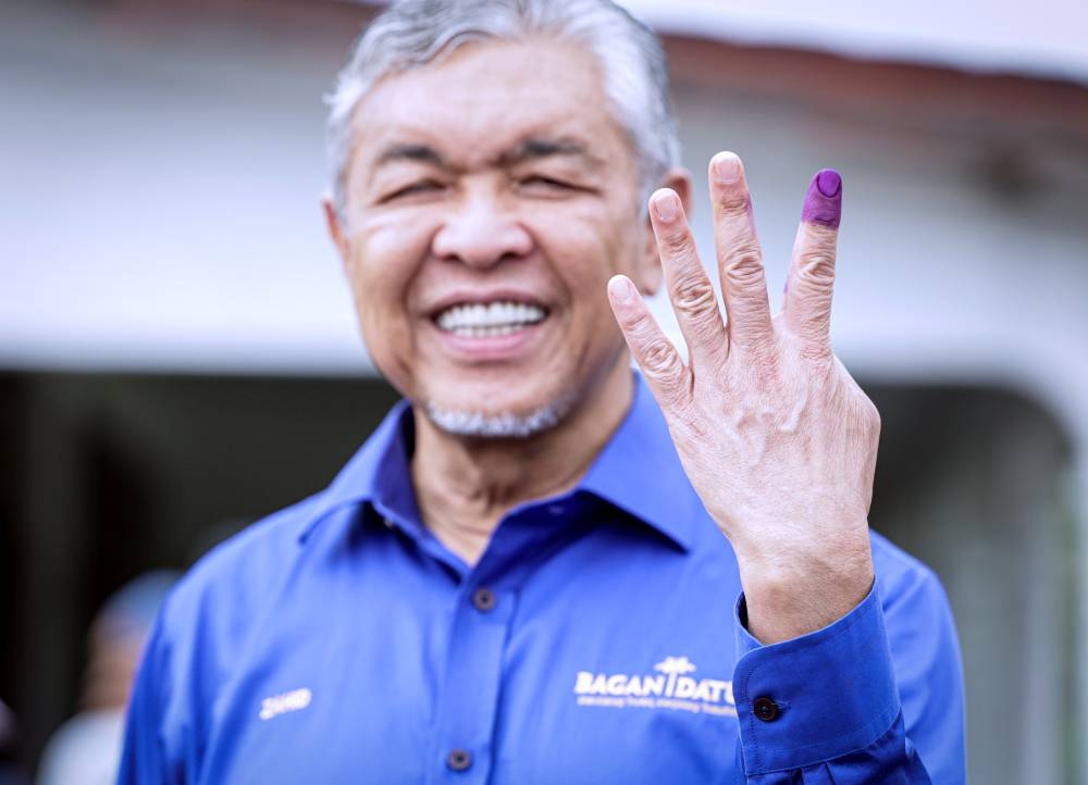 Barisan Nasional president Datuk Seri Ahmad Zahid Hamidi after casting his ballot at the Madrasah Manbail Ulum in Bagan Datuk November 19, 2022. — Bernama pic