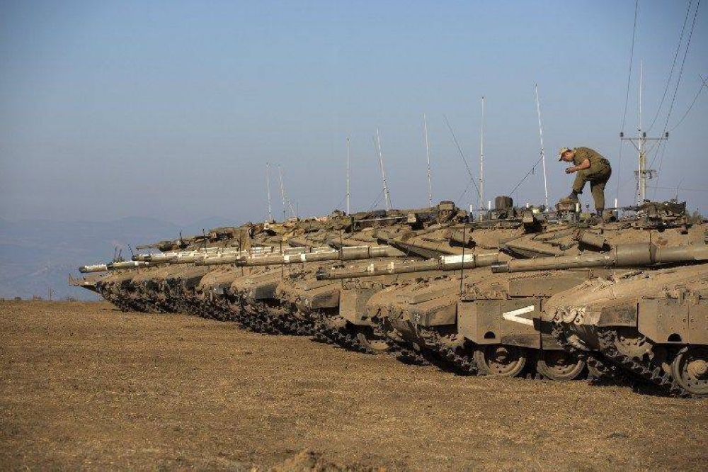 Israeli strikes on Saturday morning killed four Syrian regime soldiers and wounded one in central and western districts, Syrian state media reported. — AFP pic