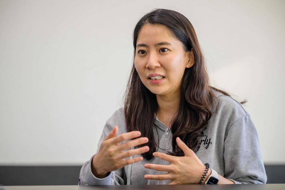 In this picture taken on September 1, 2022, next-day grocery delivery service Market Kurly founder Sophie Kim speaks during an interview at the company's headquarters in Seoul. — AFP pic