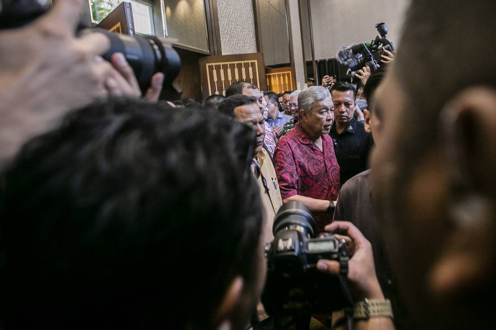 Umno president Datuk Seri Ahmad Zahid Hamidi (centre) at the press conference in Seri Pacific Hotel Kuala Lumpur, November 21, 2022. — Picture by Hari Anggara