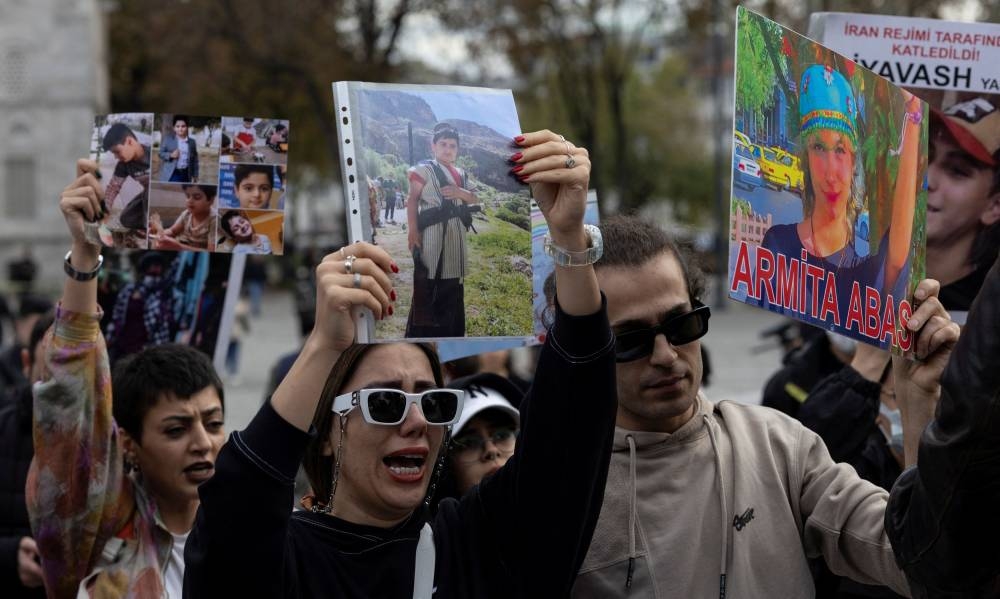 Members of the Iranian community living in Turkey attend a protest in support of Iranian women, after the death of Mahsa Amini, in Istanbul, Turkey November 19, 2022. — Reuters pic