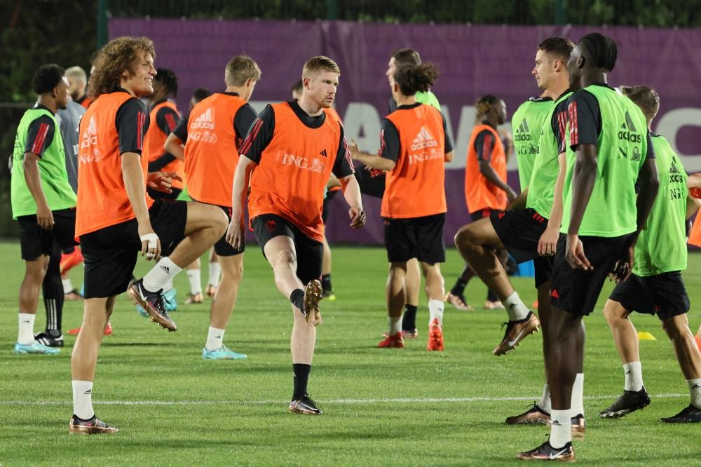 Belgium's Kevin De Bruyne (centre) during a training session with teammates in southwest Doha November 21, 2022. — Reuters pic