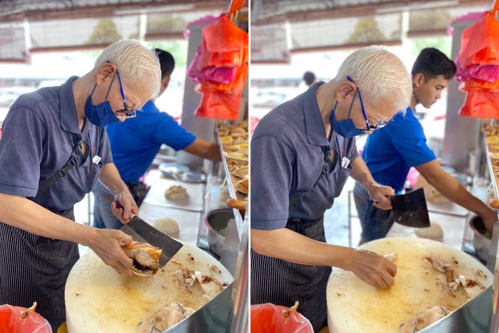 A round tray of condiments is served alongside a bowl of soup while you wait for your chicken rice.4. Mr. Lee deftly slicing chicken to order.