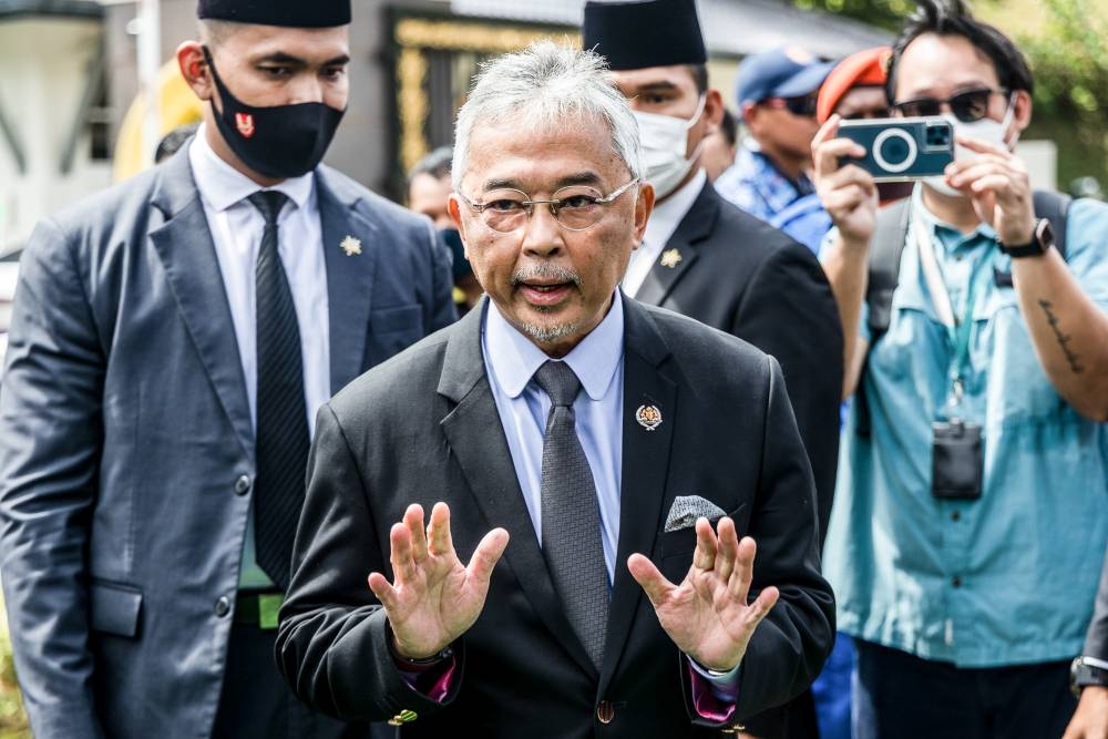 Yang di-Pertuan Agong Al-Sultan Abdullah Ri'ayatuddin Al-Mustafa Billah Shah speaks to members of the media outside Istana Negara in Kuala Lumpur November 22, 2022. — Picture by Firdaus Latif