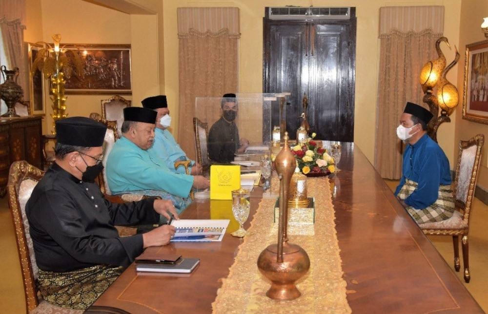 Mohd Shukri Ramli received his letter of appointment from the Raja of Perlis Tuanku Syed Sirajuddin Putra Jamalullail at the swearing-in ceremony held at the Green Room in Istana Arau, at 4pm. — Picture from Twitter/Bernama