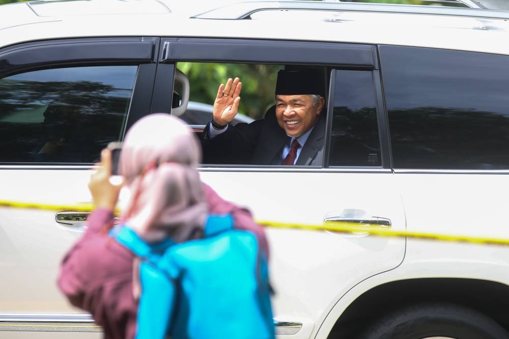 Barisan Nasional president Datuk Seri Ahmad Zahid Hamidi leaves the Istana Negara after an audience with Yang di-Pertuan Agong November 23, 2022. — Picture by Ahmad Zamzahur