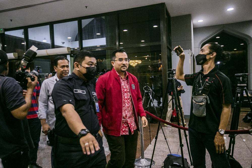 Umno Youth chief Datuk Asyraf Wajdi Dusuki arrives at the Umno headquarters in WTC Kuala Lumpur November 23, 2022. — Picture by Hari Anggara