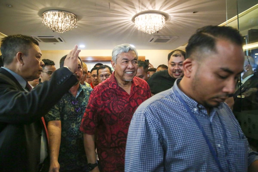 Barisan Nasional chairman Datuk Seri Ahmad Zahid Hamidi leaves the Seri Pacific Hotel after meeting Pakatan Harapan in Kuala Lumpur November 21, 2022. — Picture by Yusof Mat Isa