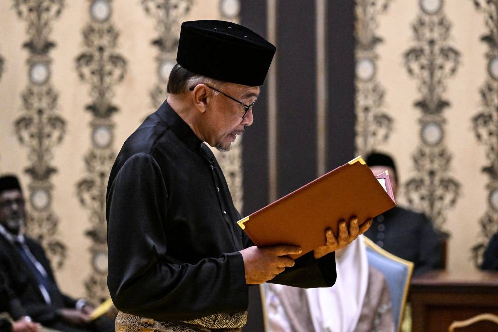 Datuk Seri Anwar Ibrahim was sworn in as Malaysia’s 10th Prime Minister at the Istana Negara at 5.06pm, November 24, 2022. — Reuters pic