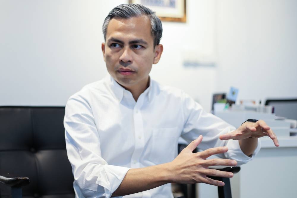 The PKR communications director Fahmi Fadzil said the cooperation with BN is on the basis of restoring Malaysia’s economy as well as improving governance and interracial and interreligious relations to stop extremism from spreading. — Picture by Ahmad Zamzahuri