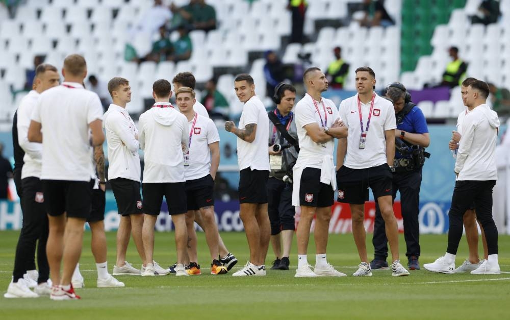 Poland players on the pitch before their Group C match against Saudi Arabia during the Fifa World Cup Qatar 2022 at the Education City Stadium in Al Rayyan in Qatar, November 26, 2022. ― Reuters pic
