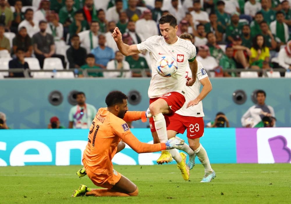 Lewandowski off the mark as Poland close in on last 16 | Malay Mail