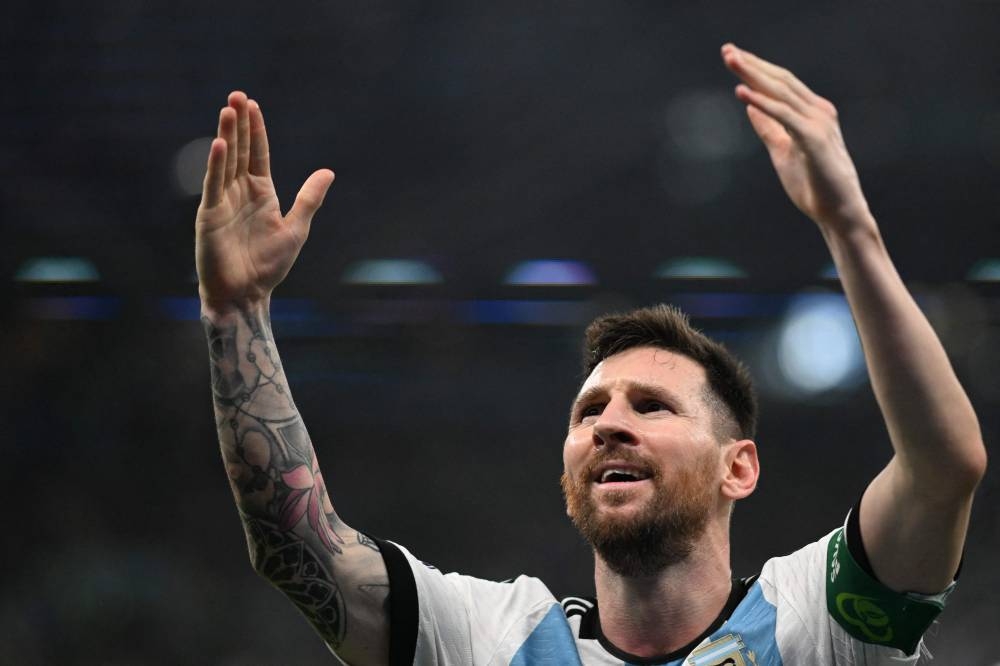 Argentina's forward Lionel Messi celebrates scoring the opening goal during the Qatar 2022 World Cup Group C football match between Argentina and Mexico at the Lusail Stadium in Lusail, north of Doha on November 26, 2022. — AFP pic