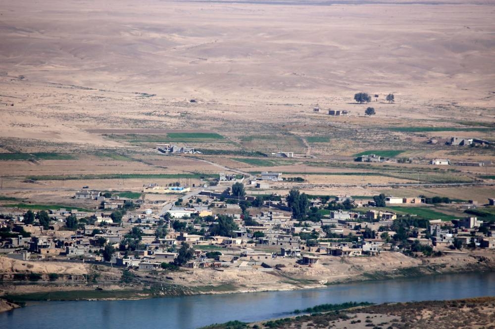 This picture taken on November 1, 2022, shows a view of the village of Messahag on the banks of the Tigris river in northern Iraq's Salaheddine province, one of the villages that will be submerged in water if the Iraqi government completes the project of building the Makhoul dam. — AFP pic