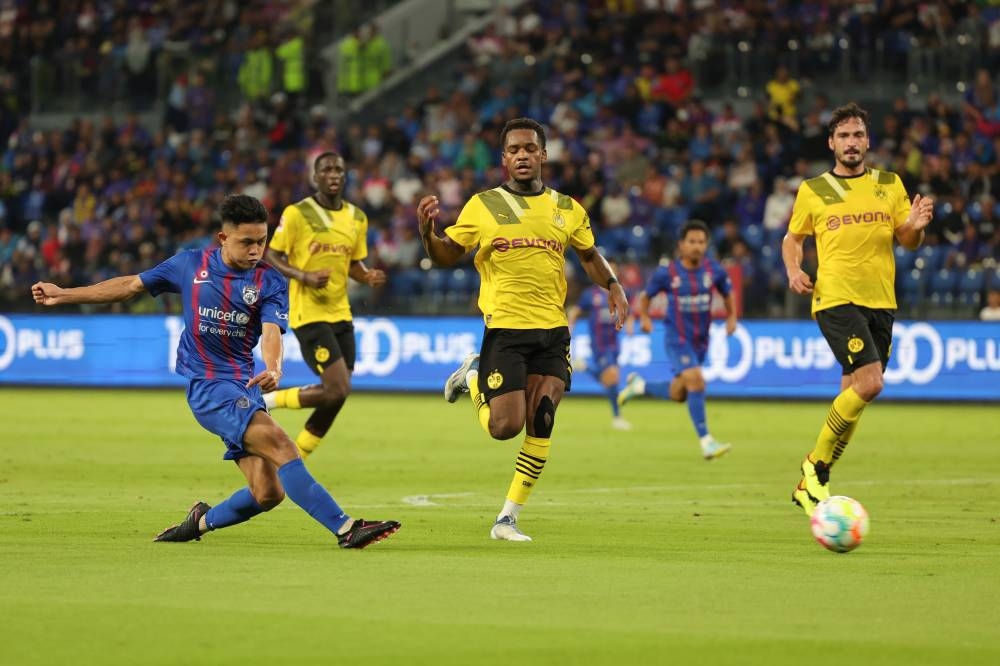 JDT’s Arif Aiman Hanapi in action against Borussia Dortmund at the Sultan Ibrahim Stadium in Iskandar Puteri, November 28, 2022. — Bernama pic 