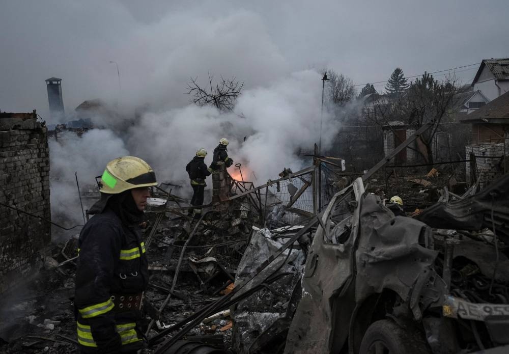 Rescuers work at a site of private houses heavily damaged by a Russian missile strike, amid Russia's attack on Ukraine, in Dnipro, Ukraine November 26, 2022. — Reuters pic